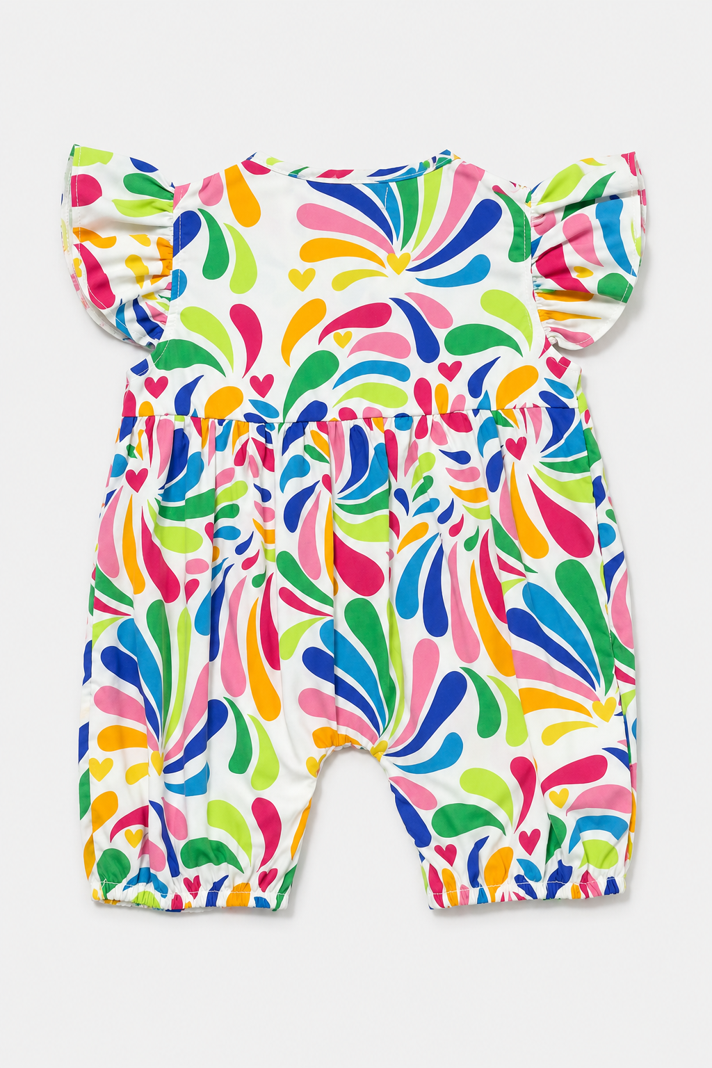 A baby romper with a colorful abstract pattern of teardrop shapes and small hearts on a white background, featuring ruffled shoulder straps and a snap closure at the crotch.